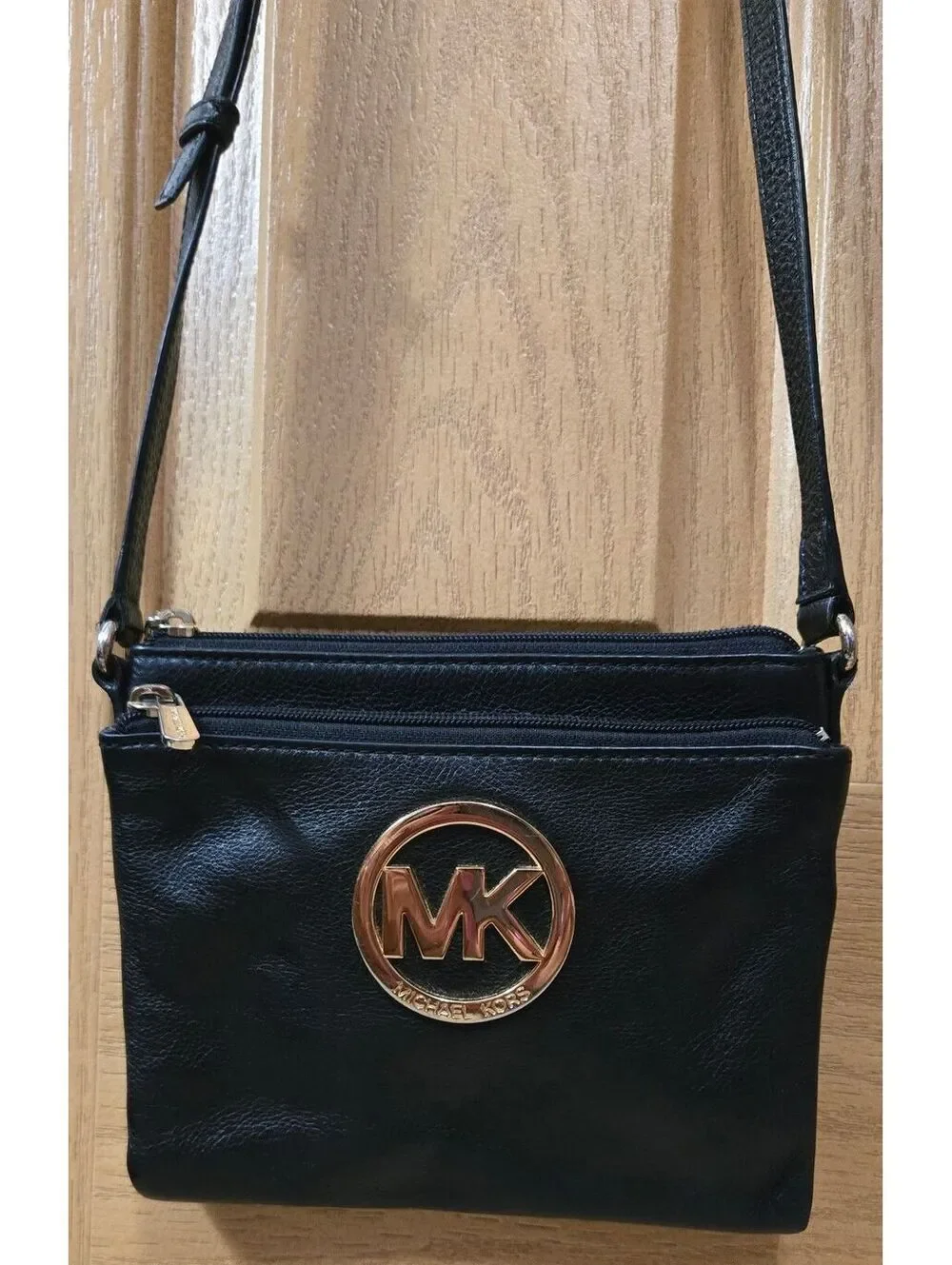 Michael Kors Black Leather Crossbody Bag with Gold Logo and Adjustable Strap